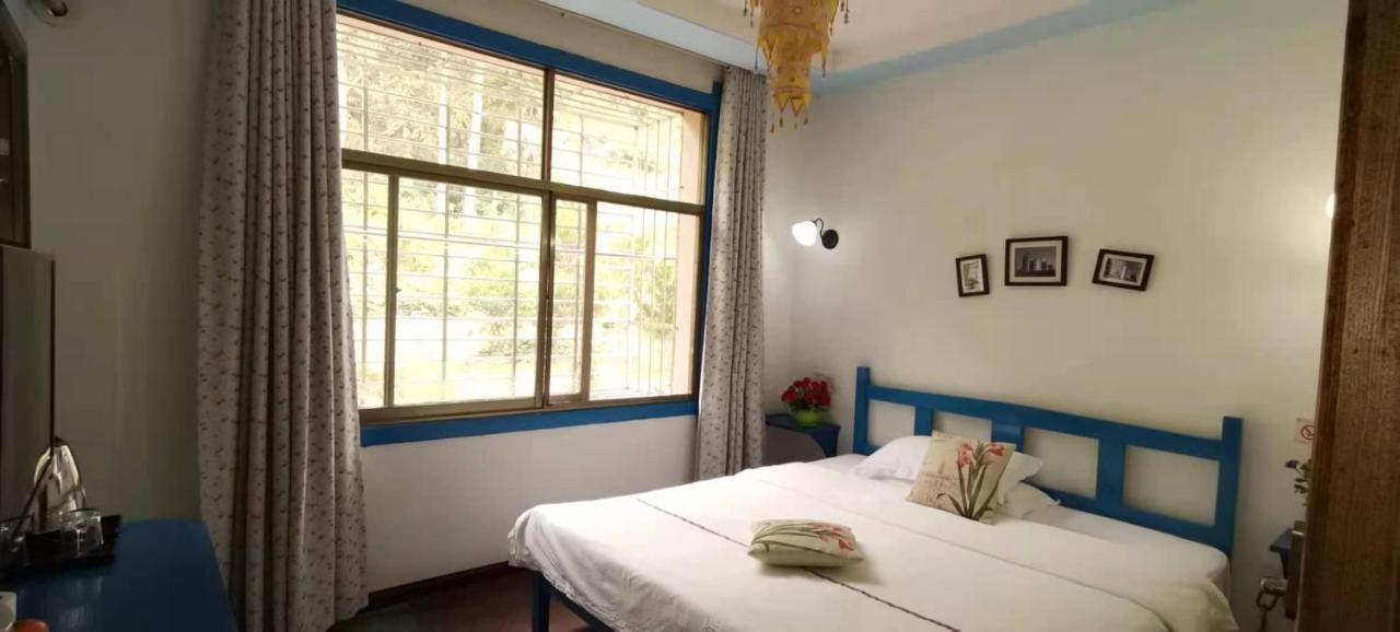 Zhangjiajie April Hostel Экстерьер фото
