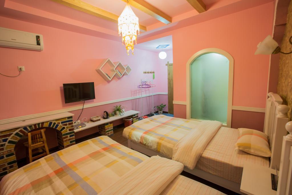 Zhangjiajie April Hostel Номер фото