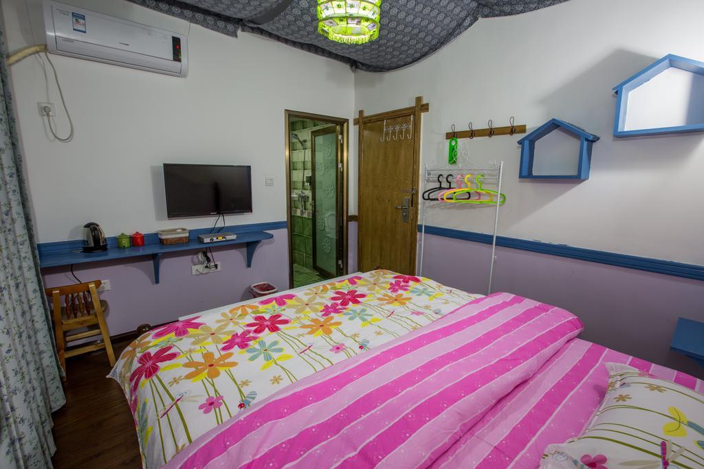 Zhangjiajie April Hostel Номер фото